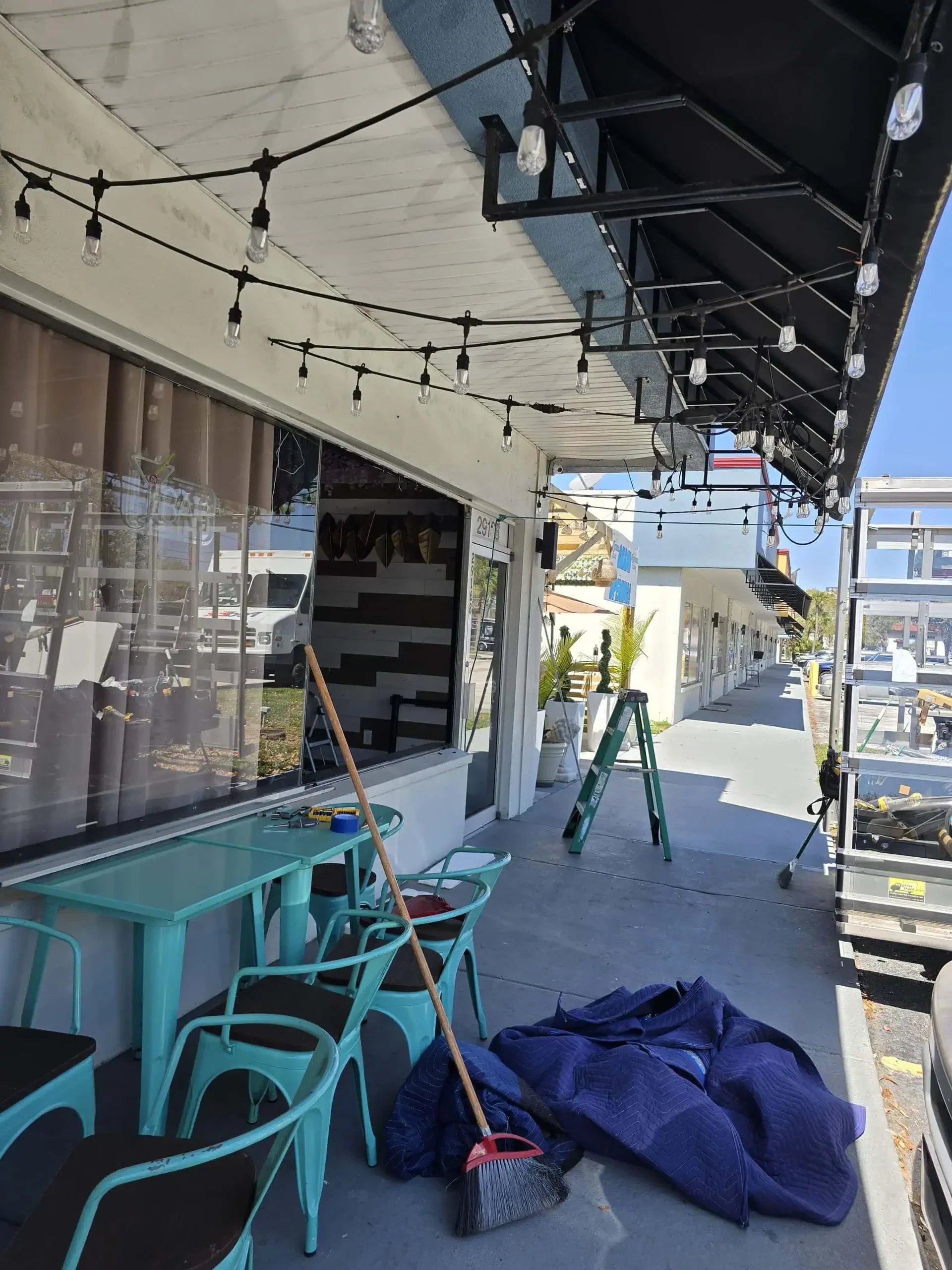 Sidewalk Scene Turquoise Chairs Pinellas County Florida