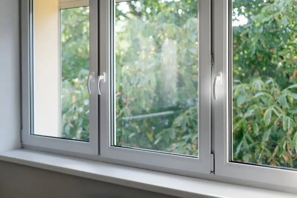 Shatterproof glass and durable frame in a modern window, showcasing reliable emergency glass repair and replacement services.